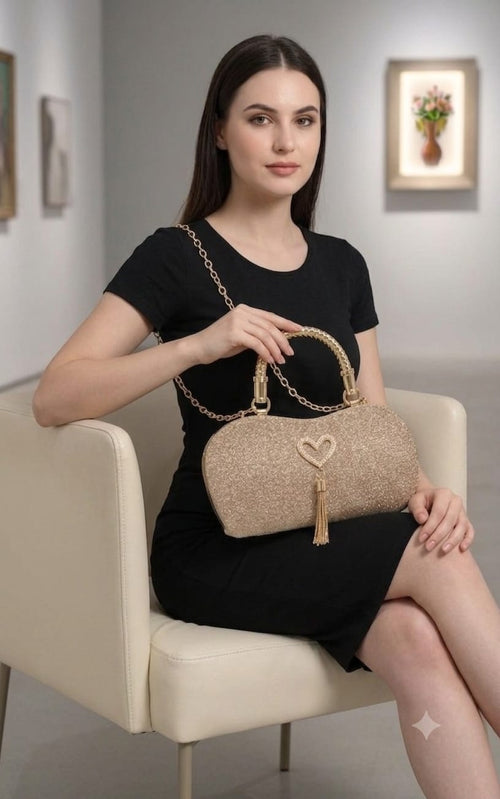 Gilded Glamour Evening Clutch – Sparkling Gold Metallic Handbag with Pearl Heart Charm & Tassel Accent